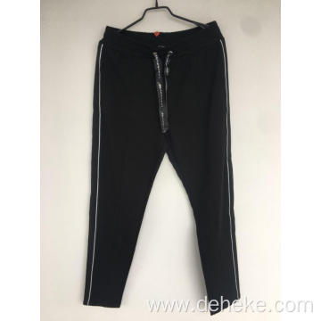 Women's knit decrop tape trousers